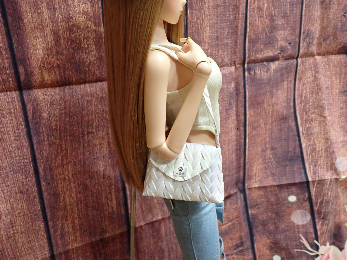 Smart doll iridescent woven purse